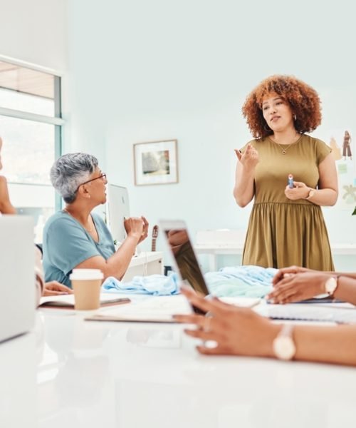 Creative,Woman,,Fashion,Designer,And,Coaching,In,Meeting,,Presentation,Or